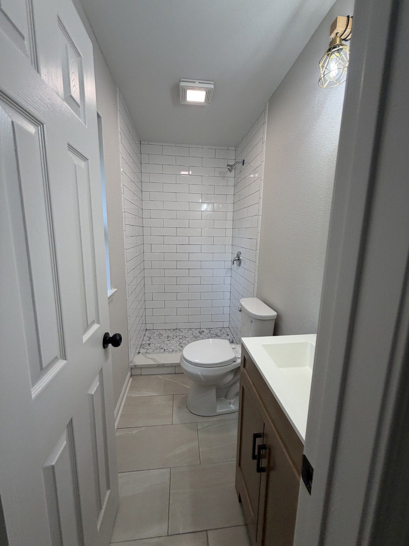 Bathroom renovation with tiled shower